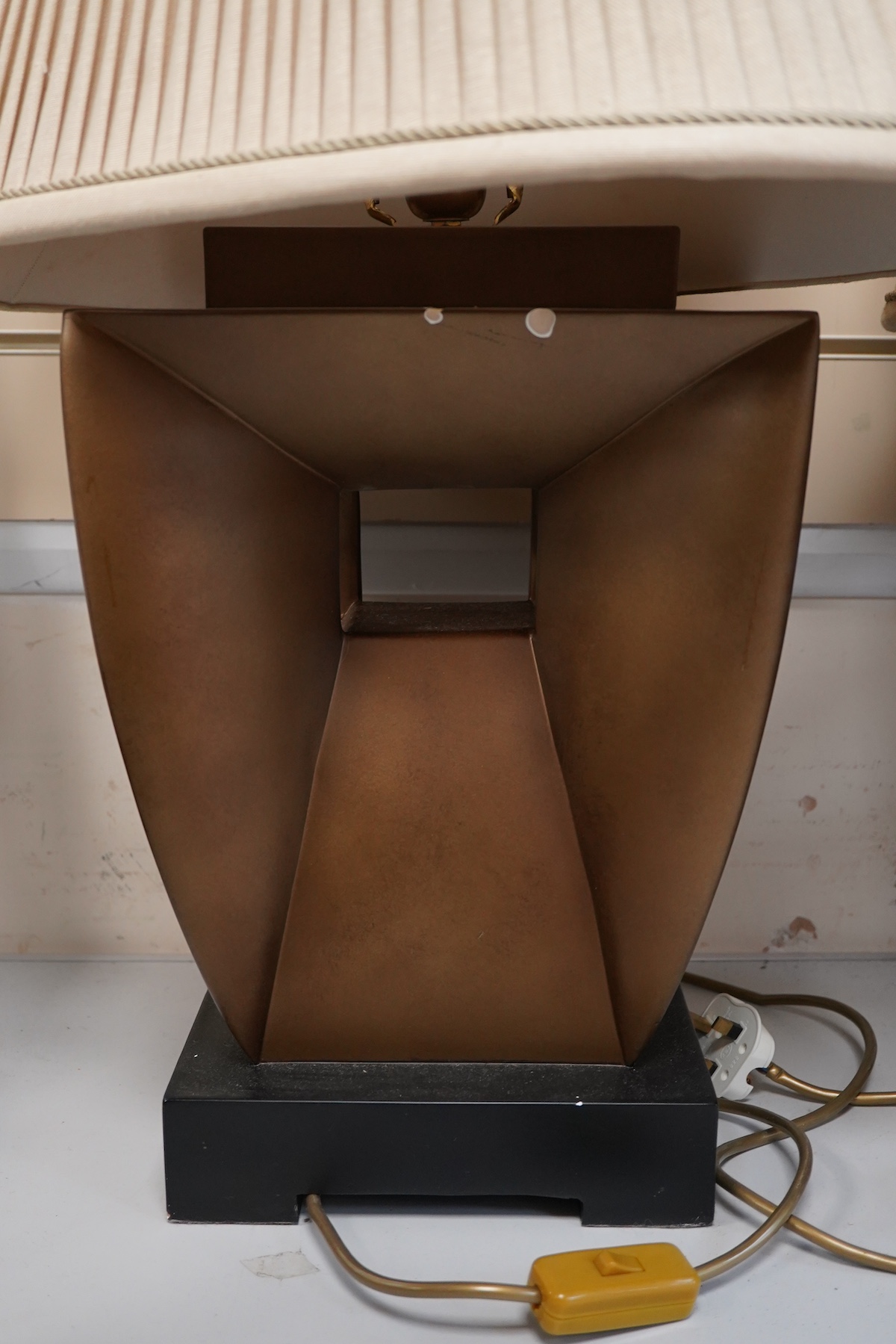 A pair of Art Deco style gilt composition table lamps and shades